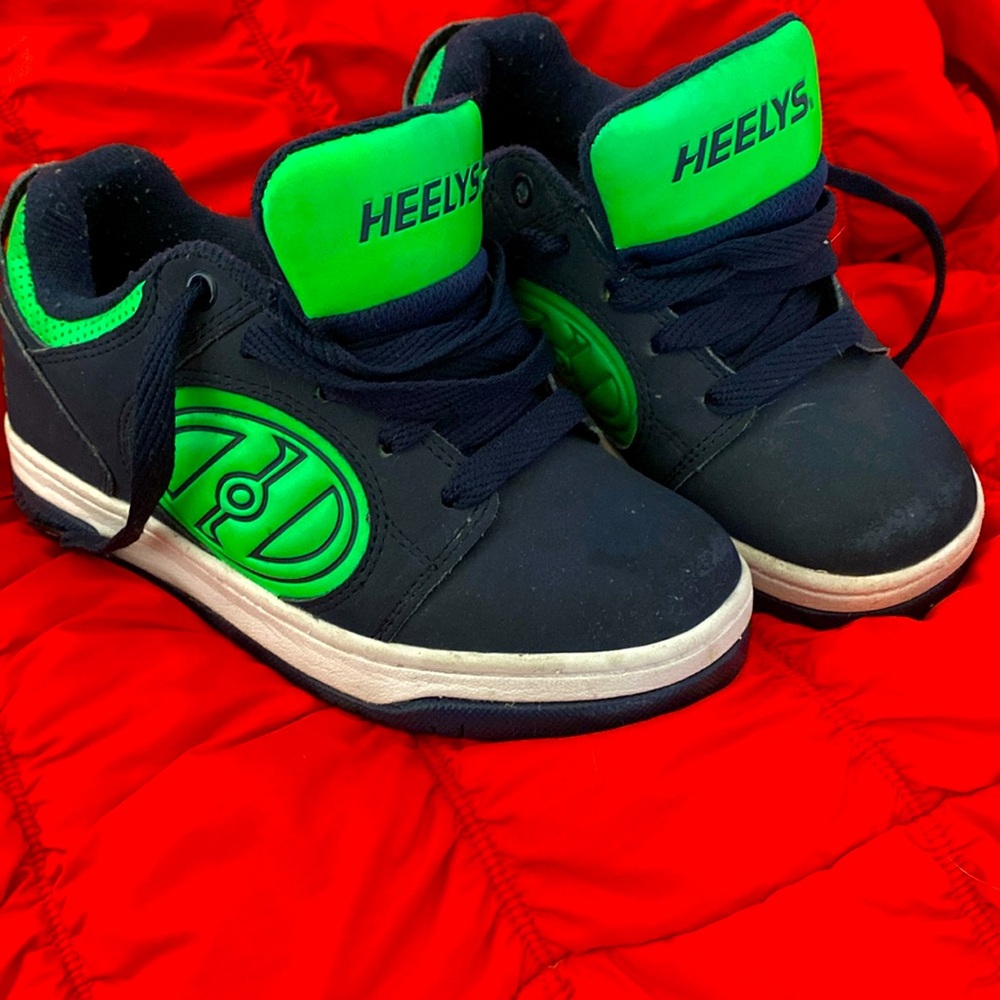 HEELYS single-roller sneakers.